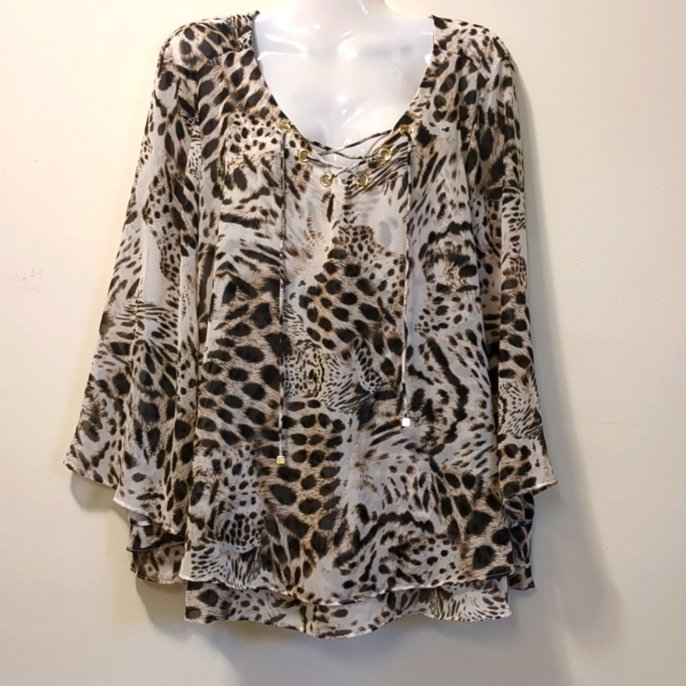 Jennifer Lopez animal print blouse
